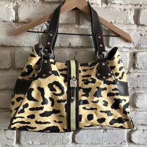 Leopard purse, yellow and brown. Used.